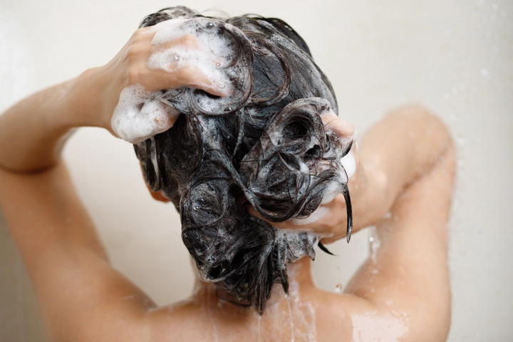 washing hair with shampoo